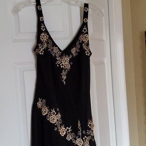 Black asymetrical dress with gold appliques